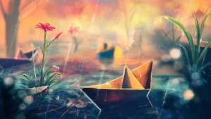 Paper boat in the rain